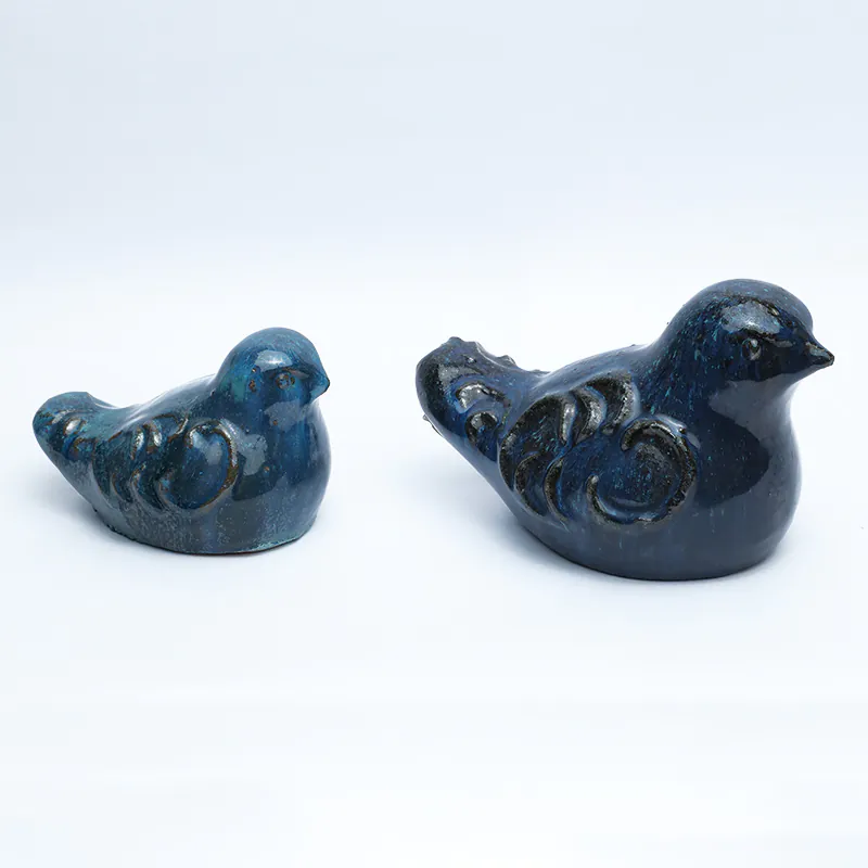 Ceramic Blue Child Sparrow Figurine - Image 3