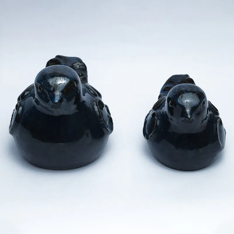 Ceramic Blue Child Sparrow Figurine - Image 2